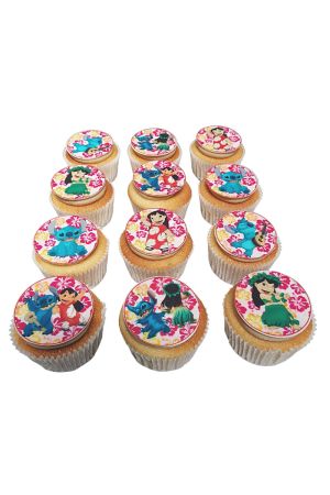 A set of cupcakes topped with edible round discs featuring various Lilo and Stitch character scenes on a pink floral background.
