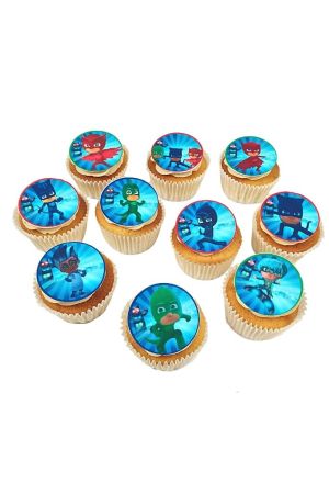 Un assortiment de cupcakes décorés d'images comestibles rondes représentant les personnages de la série Pyjamasques.
