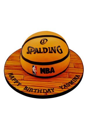 Gâteau d'anniversaire vibrant en forme de ballon de basket.