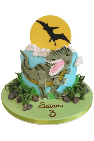 Un dinosaure T-Rex décoré pour un gâteau d'anniversaire préhistorique parfait