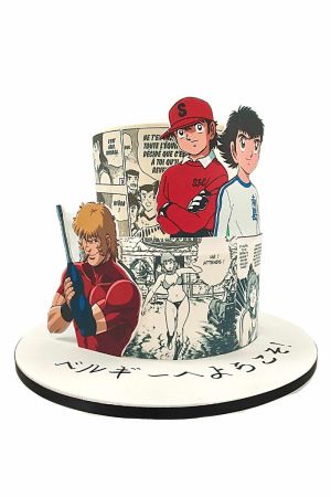 Mangas characters and cartoon images on a cake birthday cake