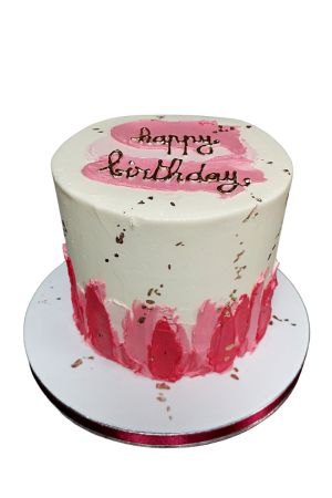 Trendy white and pink drip cake with flecks of gold and palette strokes.