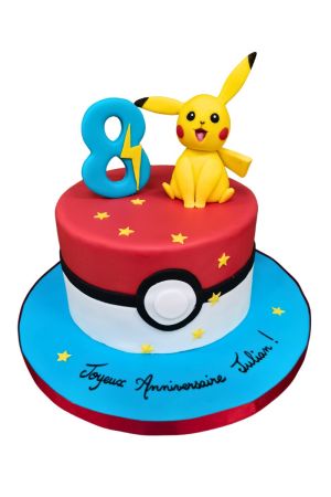 A round fondant birthday cake designed like a red and white 3D Pokéball, topped with a detailed yellow sugar figurine of Pikachu sitting next to a large blue number eight with a lightning bolt.