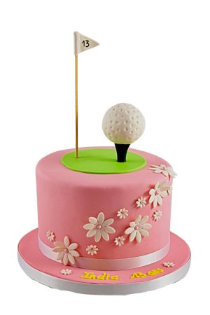 Pink floral golf birthday cake with a white sugar golf ball on a tee and flag pin by The French Cake Company