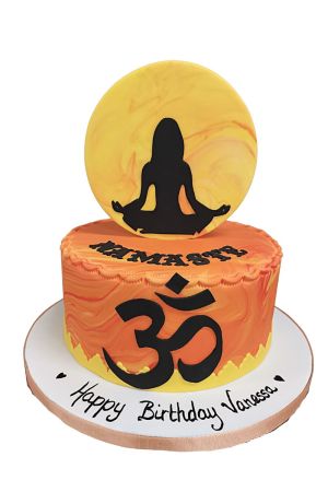 Gâteau d'anniversaire zen thème yoga marbré orange avec silhouette méditation et symbole Om conçu par The French Cake Company