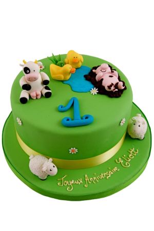 Farm animals on a birthday cake