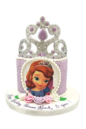Gâteau Princesse Sofia avec une couronne et un message personnalisé sur le plateau