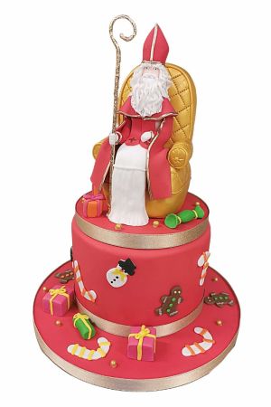 Le grand Saint Nicolas sur son trône, posé sur un gâteau