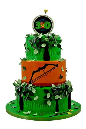Three-tier green and orange archery birthday cake with fondant leaves, bow silhouette, and bullseye target topper hit by an arrow