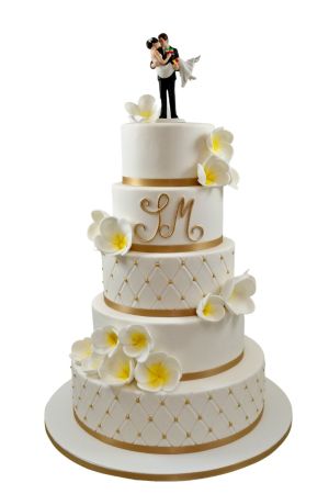 Bruidstaart met gouden en exotische bloemen