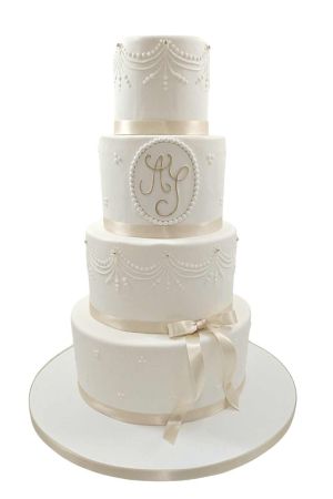 Gâteau de mariage nœud et perles