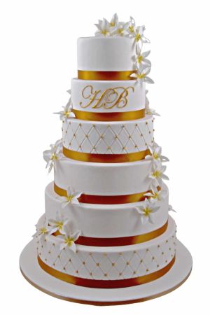 gold and white wedding cake