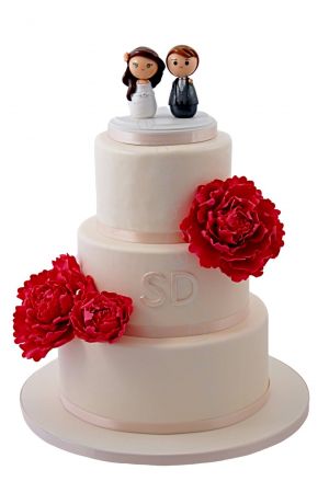 Beautiful wedding cake with peonies