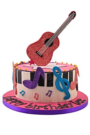 Guitar and piano birthday cake