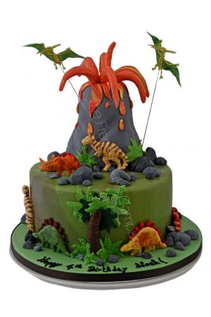 Dinosaurs and volcano birthday cake