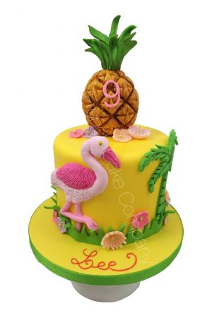 Flamingo and pineapple birthday cake