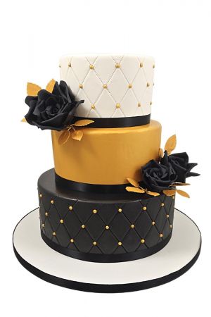 Zwarte en gouden taart voor vrouwen