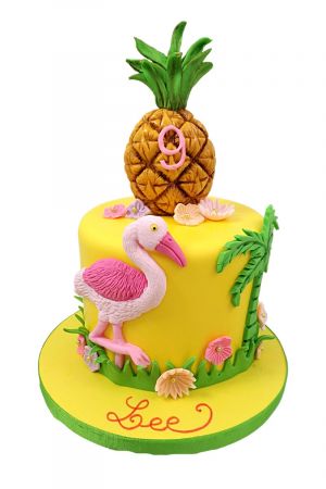 Flamingo and pineapple birthday cake