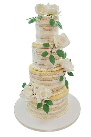Naked cake with white roses